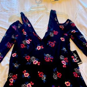 EXPRESS ladies dress size: medium black with floral print throughout never worn